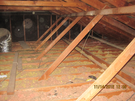 Cellulose insulation before removal